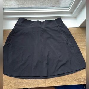 Athleta Women’s  Tee Time black high rise 15” Skort size 4